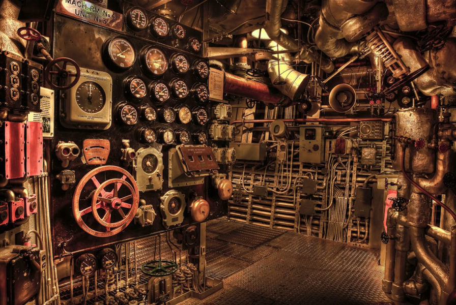 An image of an engine room depicting the tools of a marine mechanic