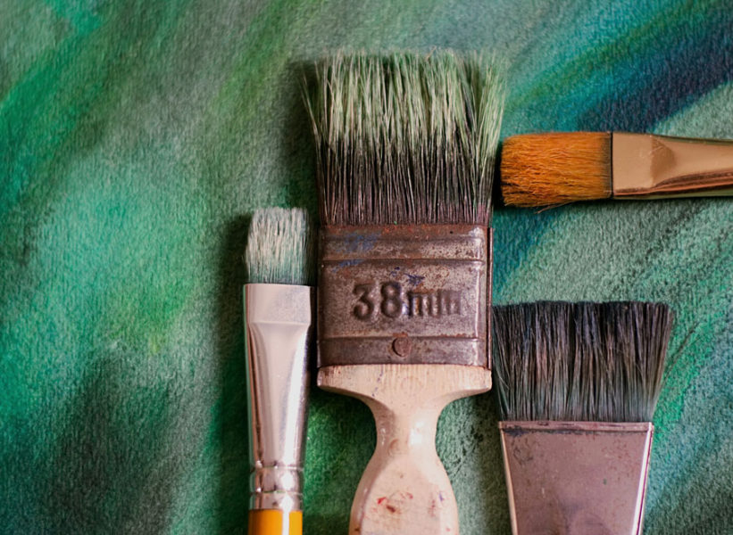 Image of a paintbrush symbolizing the tools of a wood painter