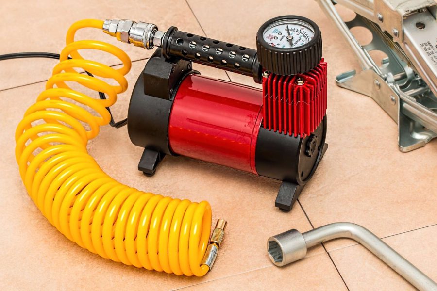 An air compressor that required tool of an electric motor mechanic