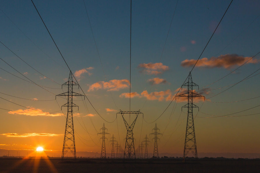 Power pylons at sunset to denote the industry trends of the generator market