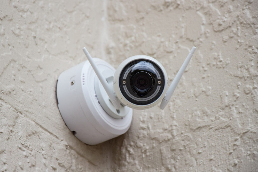 Image of a smart security camera hanging on the wall depicting best smart security camera in the market
