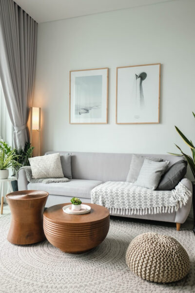 Image of a living room with minimalist wall art hanging over a couch
